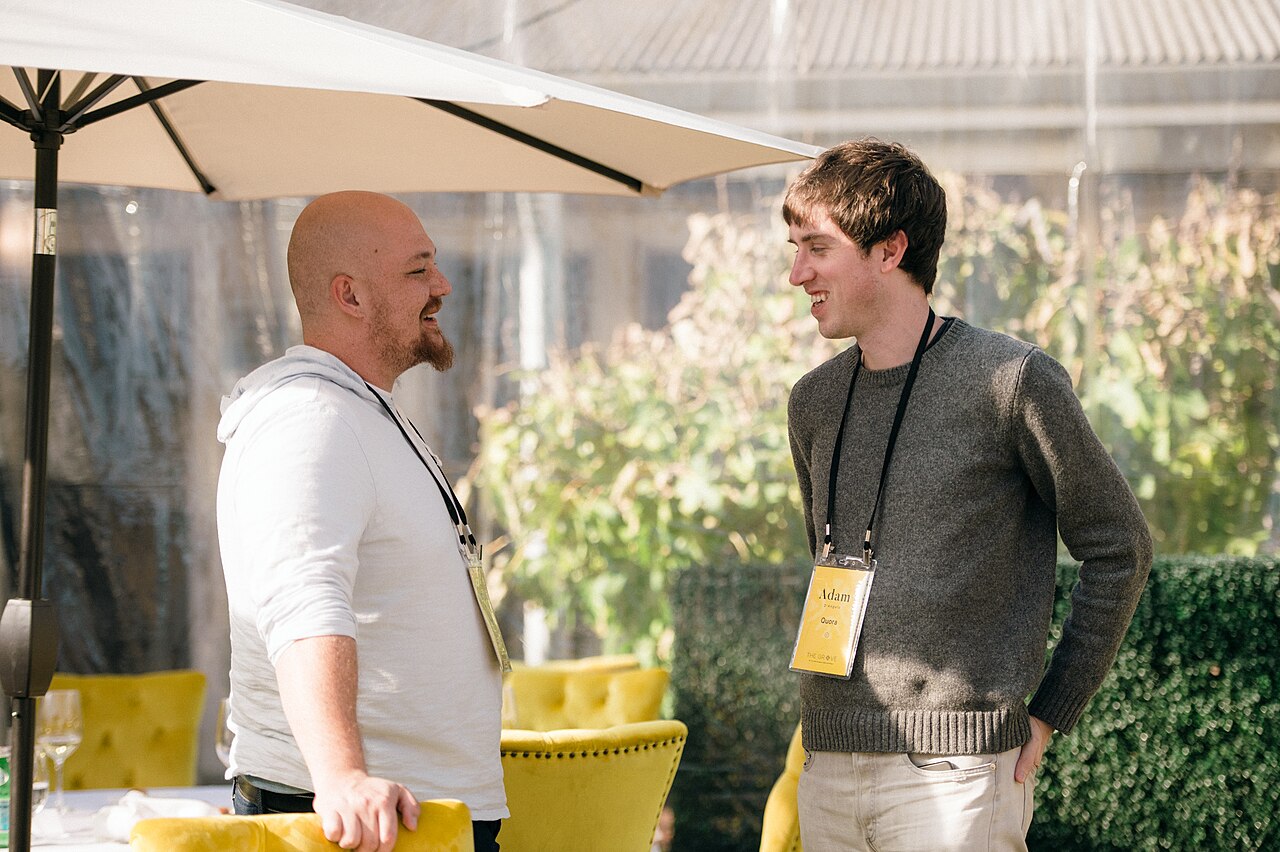 Replit CEO Amjad Masad and Adam D'Angelo appear together at The Grove in 2022.