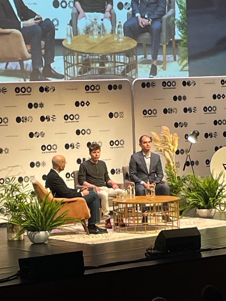 Ilya Sutskever and Sam Altman appear together at Tel Aviv University in June 2023.